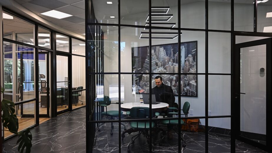 Office boy supporting daily operations in a modern Dubai office